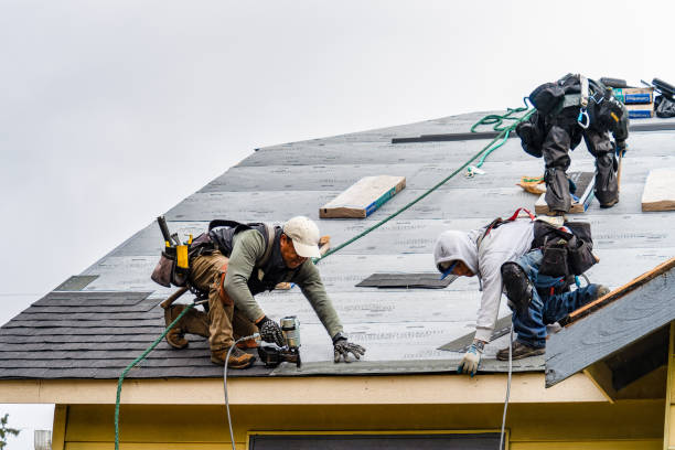 Professional Roof Replacement technician working in Mc Lean, NY